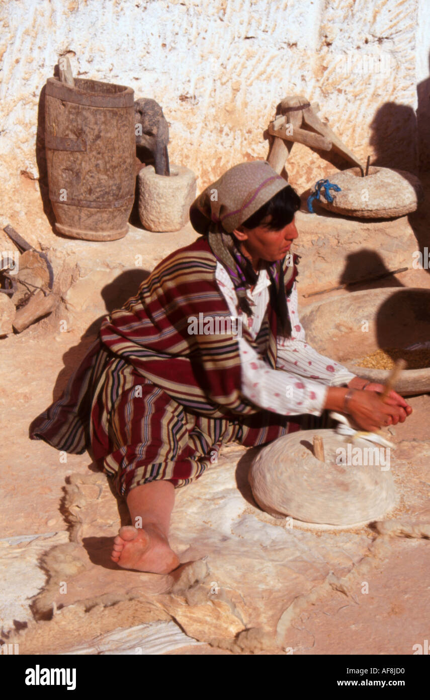 Local woman making bread in town of Matmata Tunisia Stock Photo