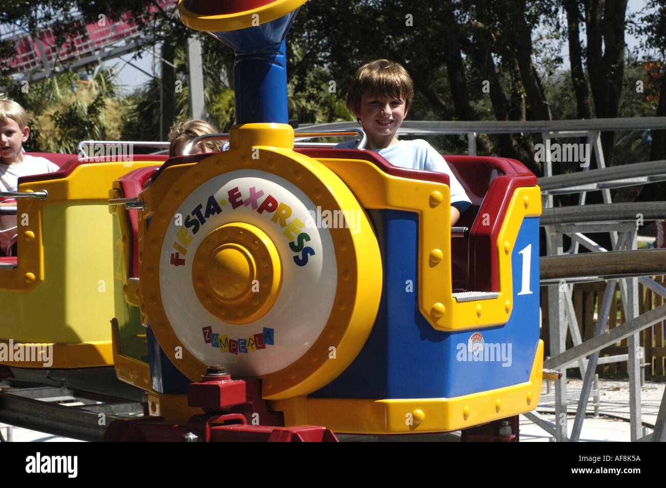 Cypress Gardens Adventure Park Florida Fl Winter Haven Florida attractions children on colorful train ride Stock Photo