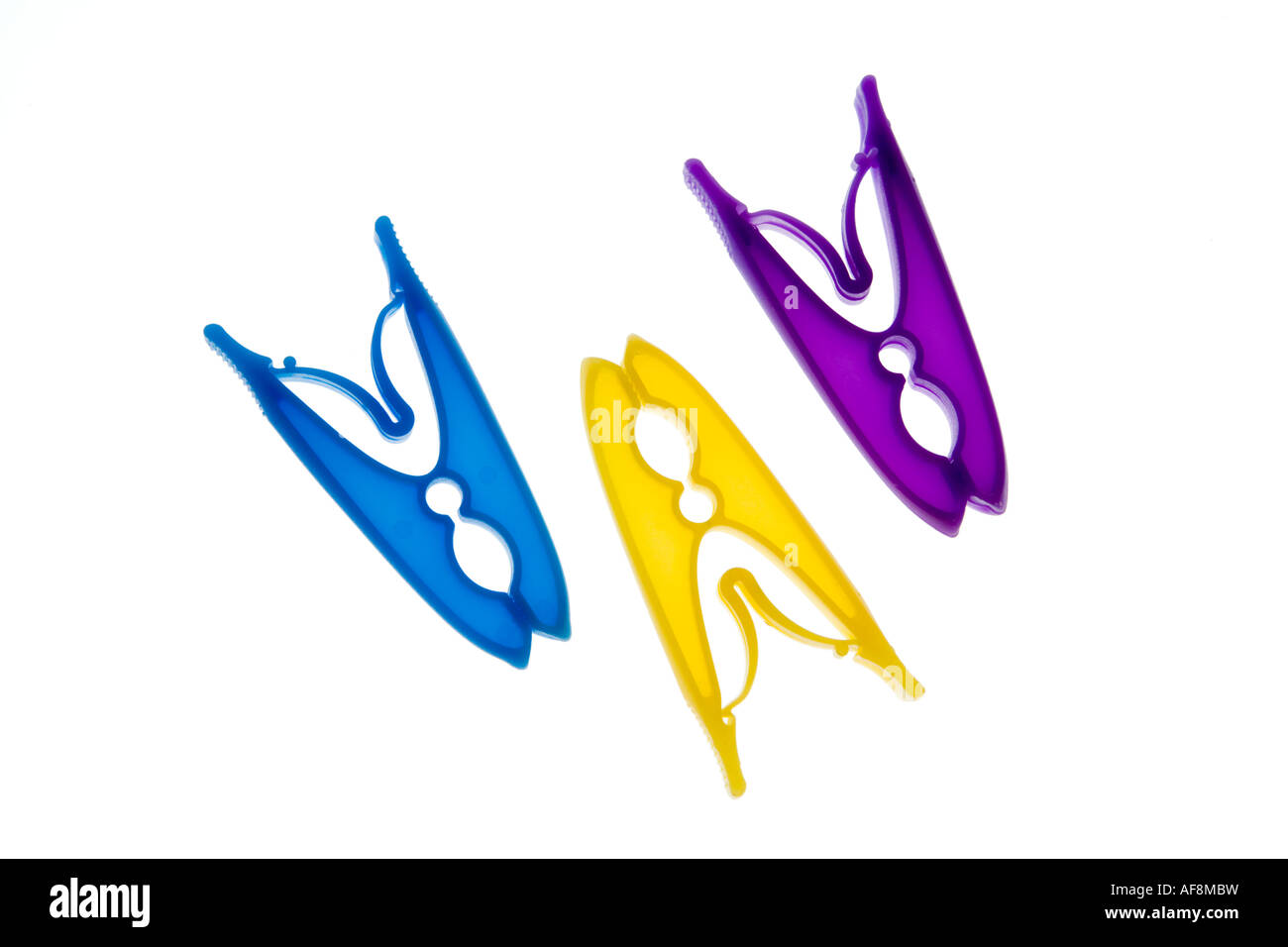 Pegs on a white background Stock Photo Alamy