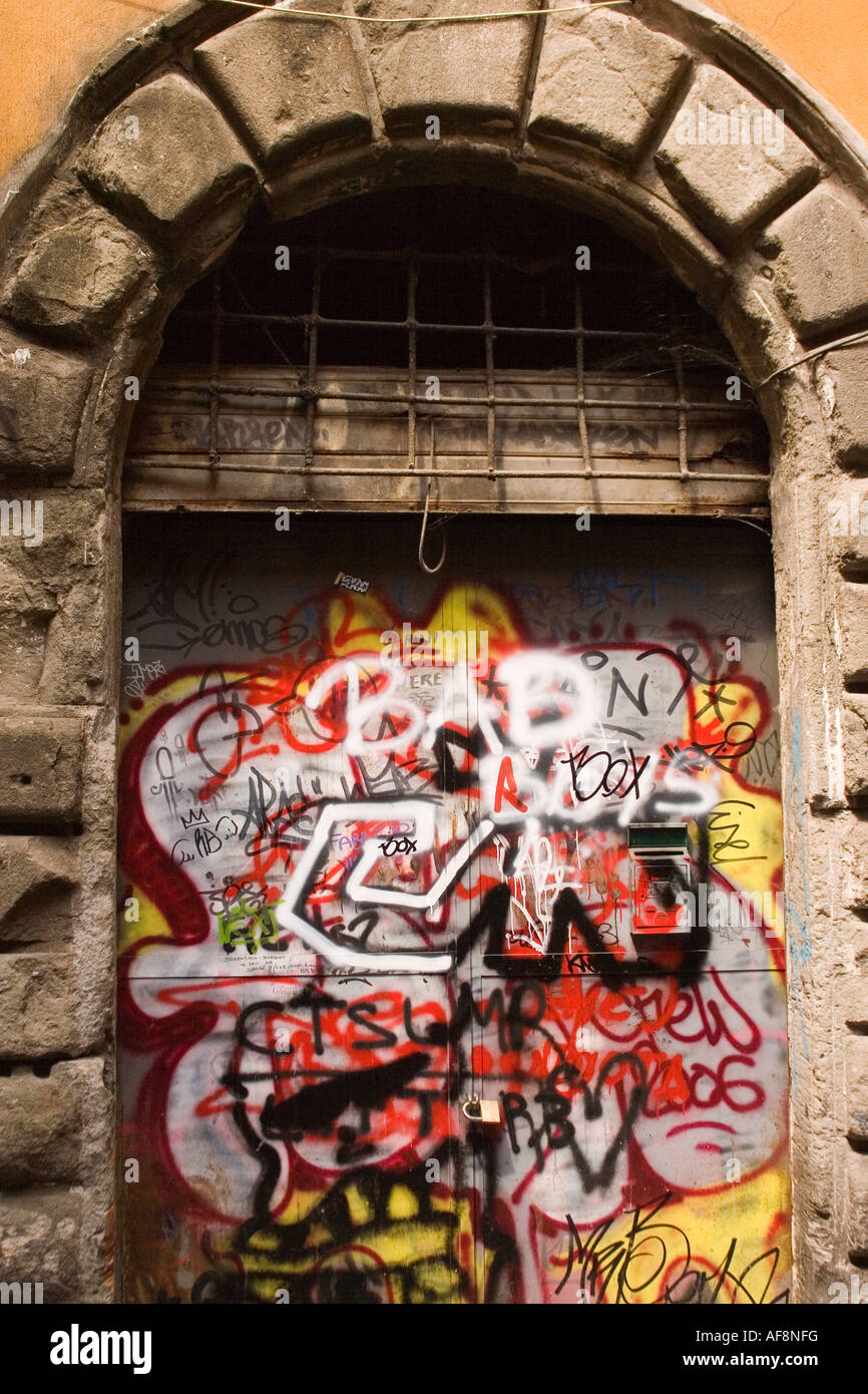 Testaccio alleyway with industrial-themed graffiti