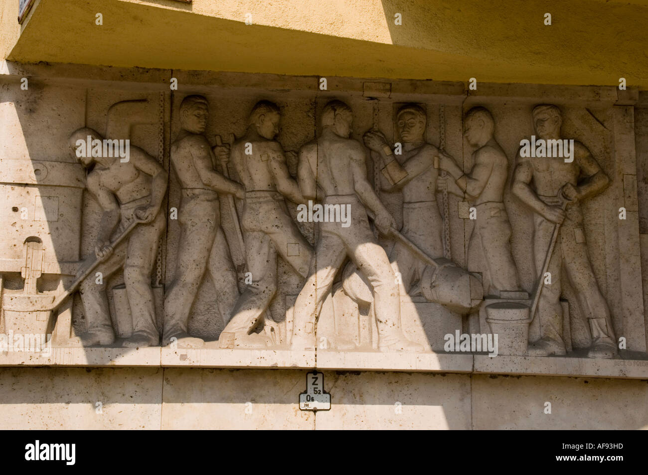 Communist workers party sculpture on a building in Budapest, Hungary Stock Photo