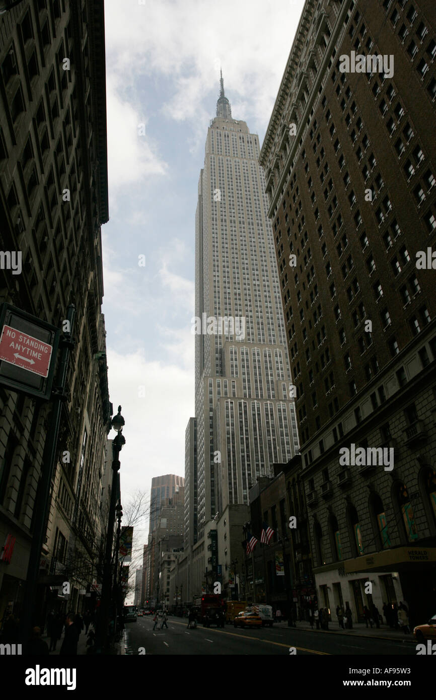View of the empire state building from West 34th Street and Broadway junction new york city new york USA Stock Photo