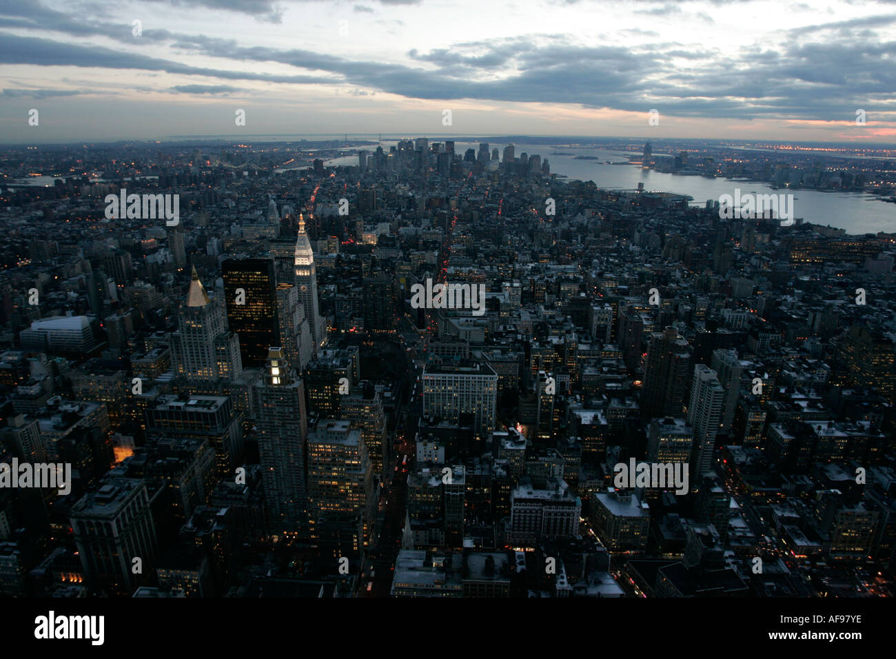 evening night view of south manhattan and sunset from observation deck 86th floor near the top of the empire state building Stock Photo