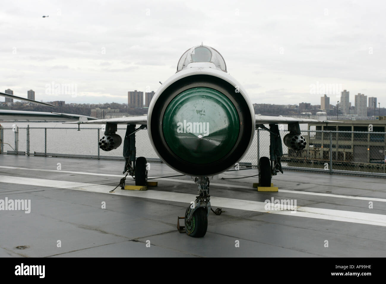 Polish air force Mig 21 PFM on display on the flight deck at the Intrepid Sea Air Space Museum new york city new york USA Stock Photo