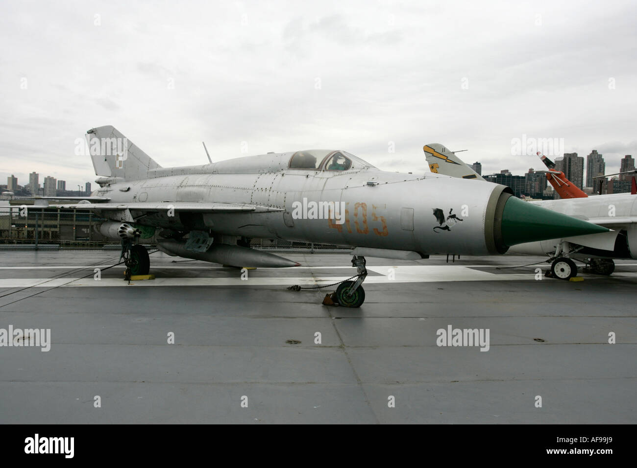 Polish air force Mig 21 PFM on display on the flight deck at the Intrepid Sea Air Space Museum new york city new york USA Stock Photo