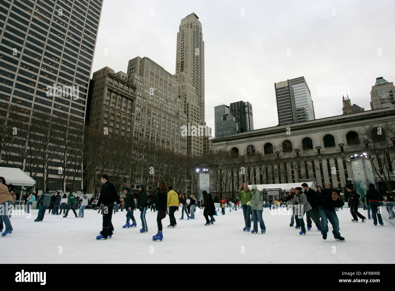 people skating on the ice at Bryant Park ice skating rink new york city
