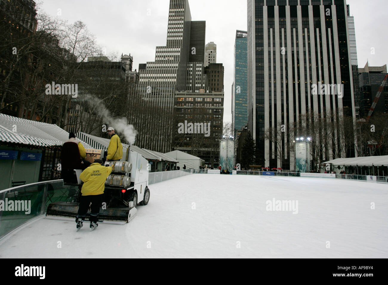 olympia zamboni ice clearer and assistants clearing the ice at Bryant