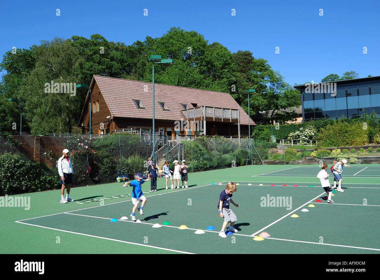 Children's tennis lesson, Bracknell Tennis Club, Lilly Hill, Berkshire,  England, United Kingdom Stock Photo - Alamy