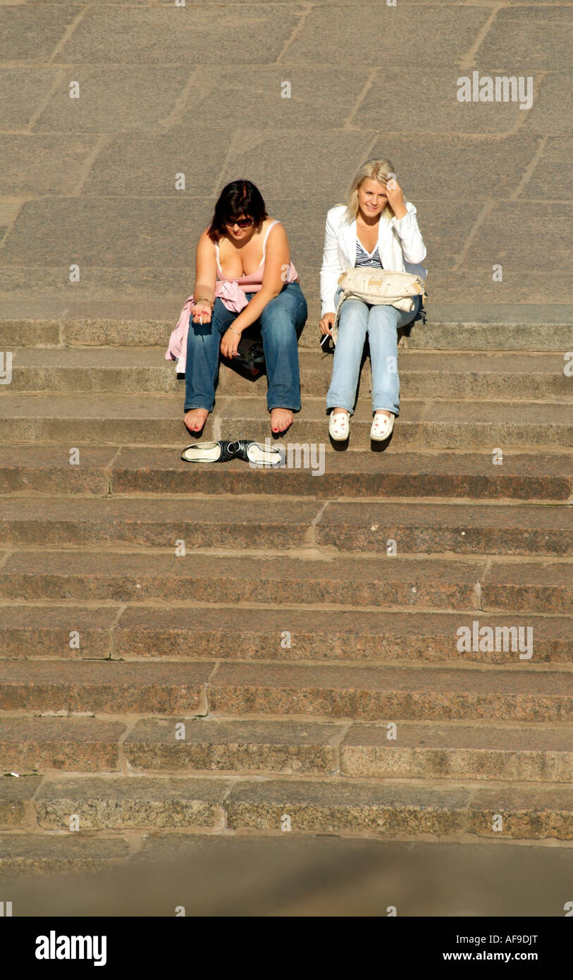 Young women sit on steps St Petersburg Russia Stock Photo Alamy