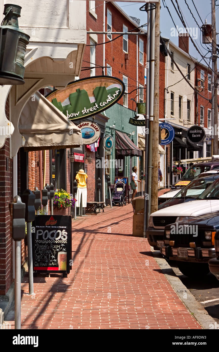 Stores and restaurants line a brick sidewalk in downtown Portsmouth New