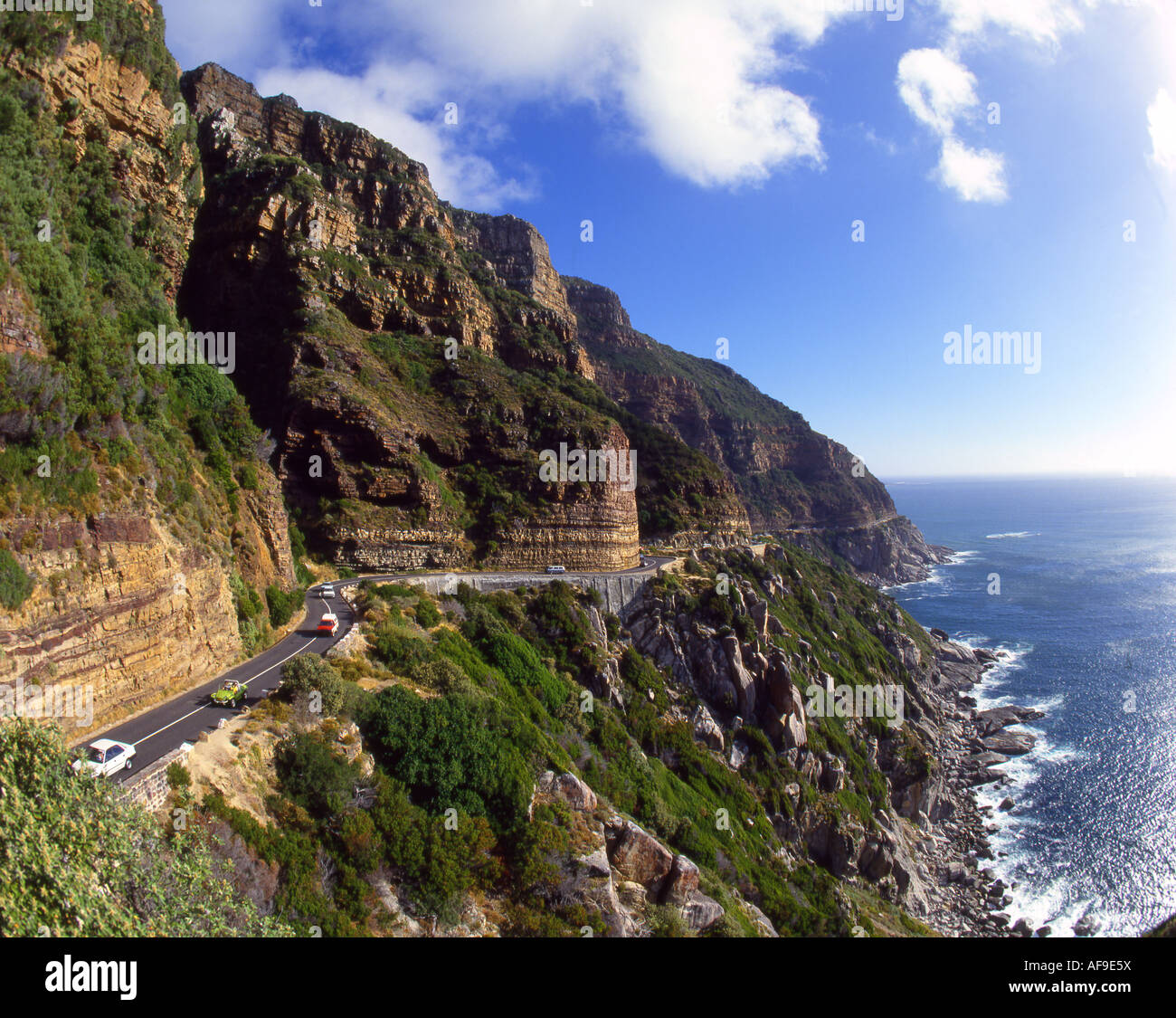 Vehicles driving along Chapmans Peak Drive near Cape Town Western Cape Province; South Africa Stock Photo
