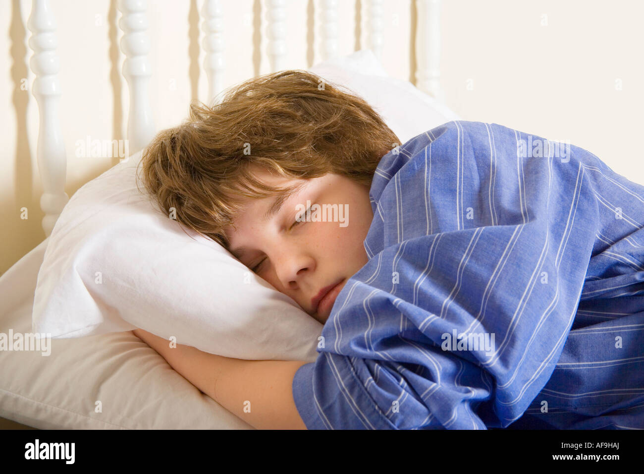 Child sleeps in his bed Stock Photo - Alamy