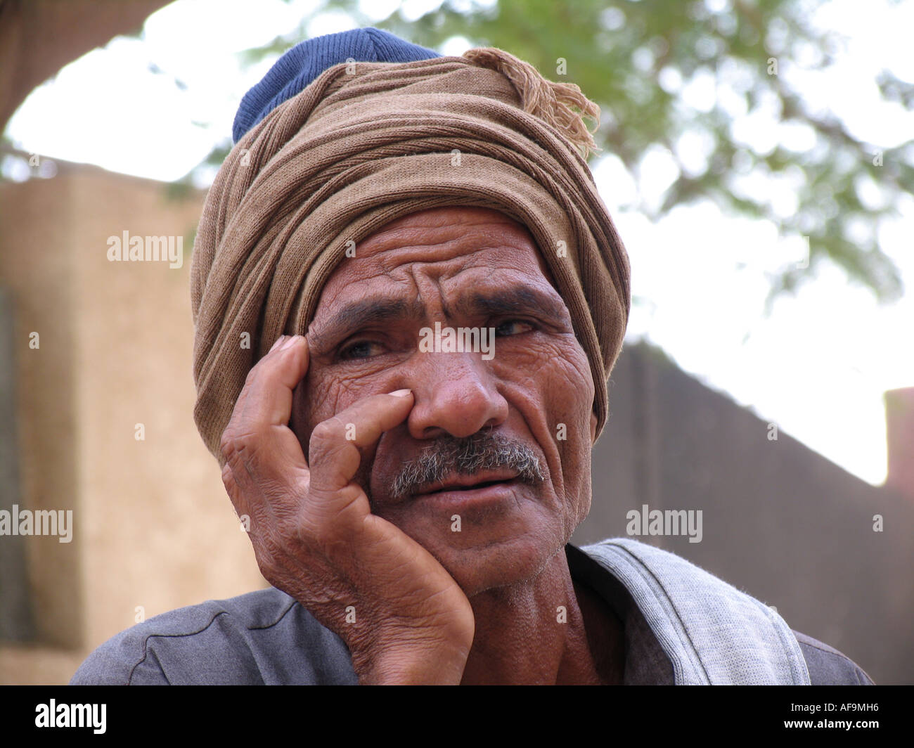 Thoughtful man with turban and moustache hi-res stock photography and ...
