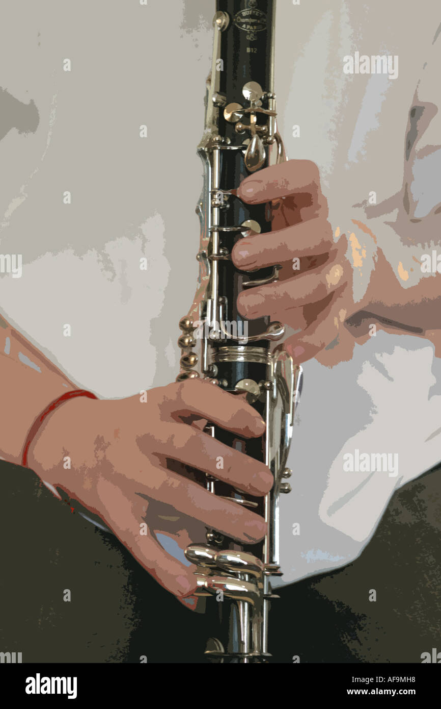 A Stock Photograph of a Boy Playing a Clarinet Stock Photo