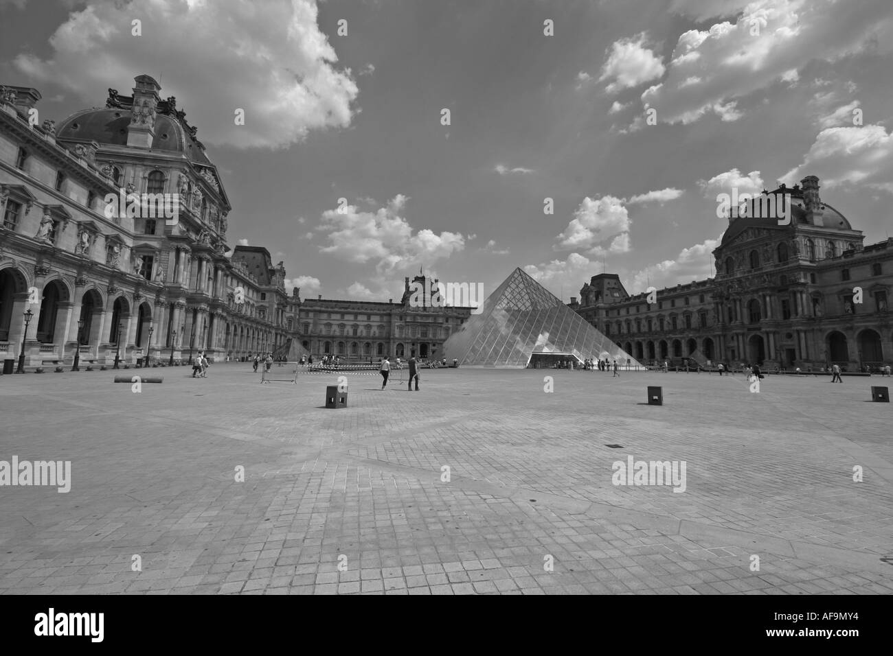 A Stock Photograph of the Louvre Museum s Pyramid in Black and White Stock Photo