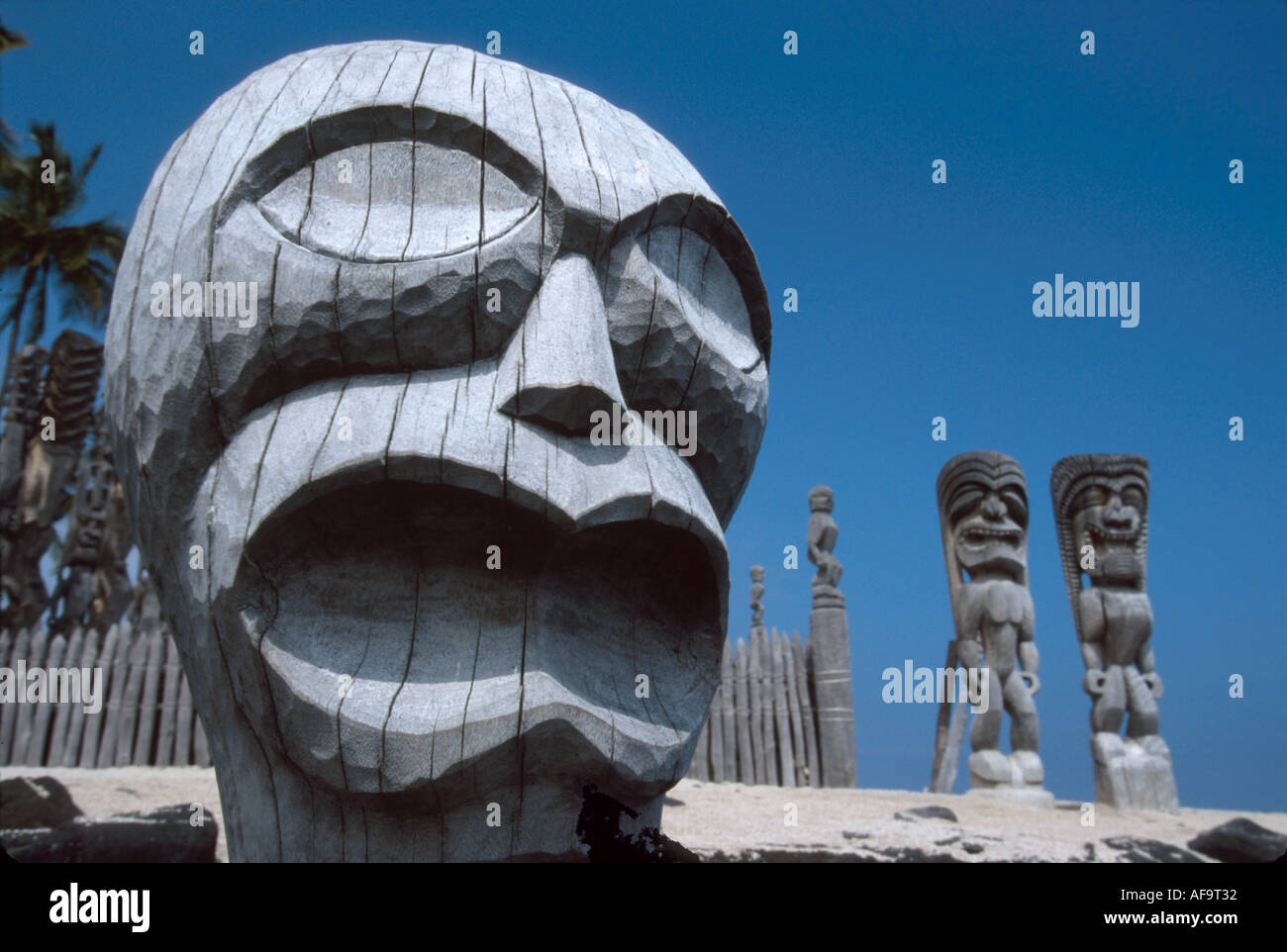 Hawaii,Hawaiian Islands,Big Island of Hawaii Pu'uhonua o Honaunau National historic Park,public land,recreation,tikis by 12th century City of Refuge t Stock Photo