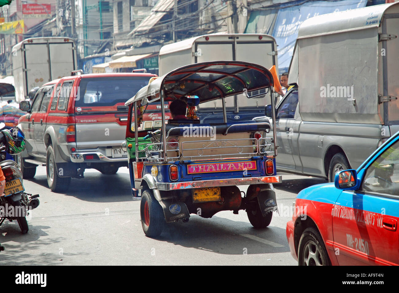 tuk-tuk, auto rickshaw in road traffic, Thailand, Bangkok Stock Photo