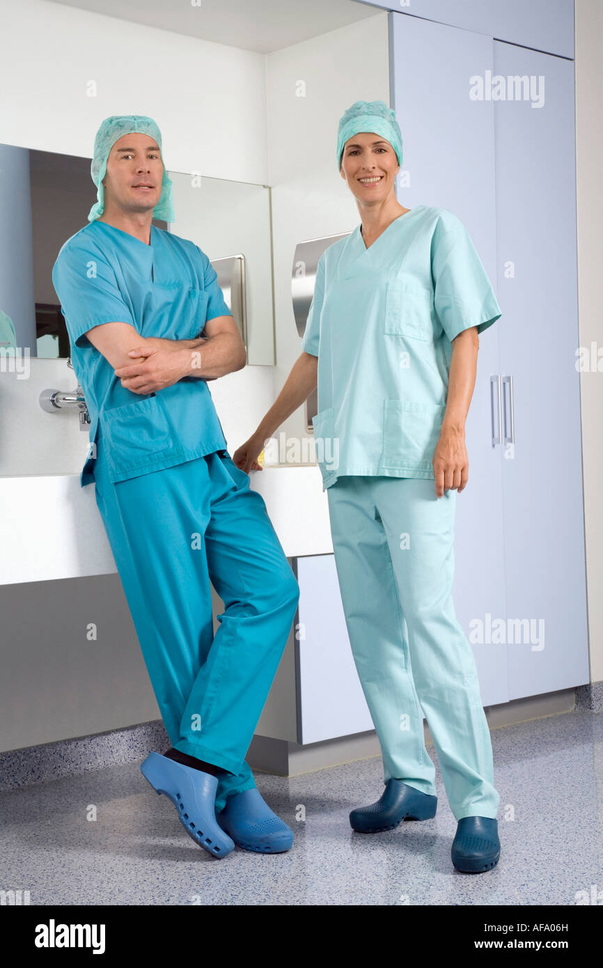 Surgeons in washing room Stock Photo