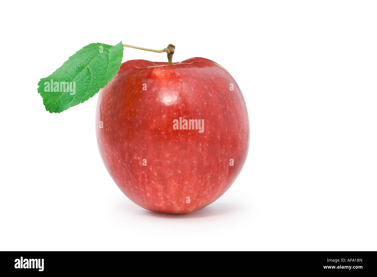 red apple with green leaf Stock Photo - Alamy