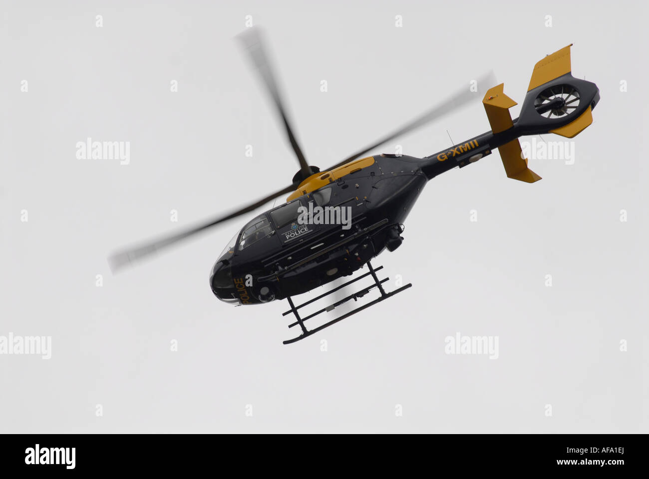 Police helicopter carrying out surveillance in Liverpool 2007 Stock Photo