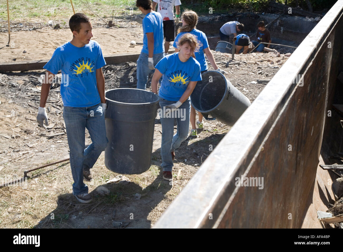 Volunteers Clean Up Vacant Lot Stock Photo