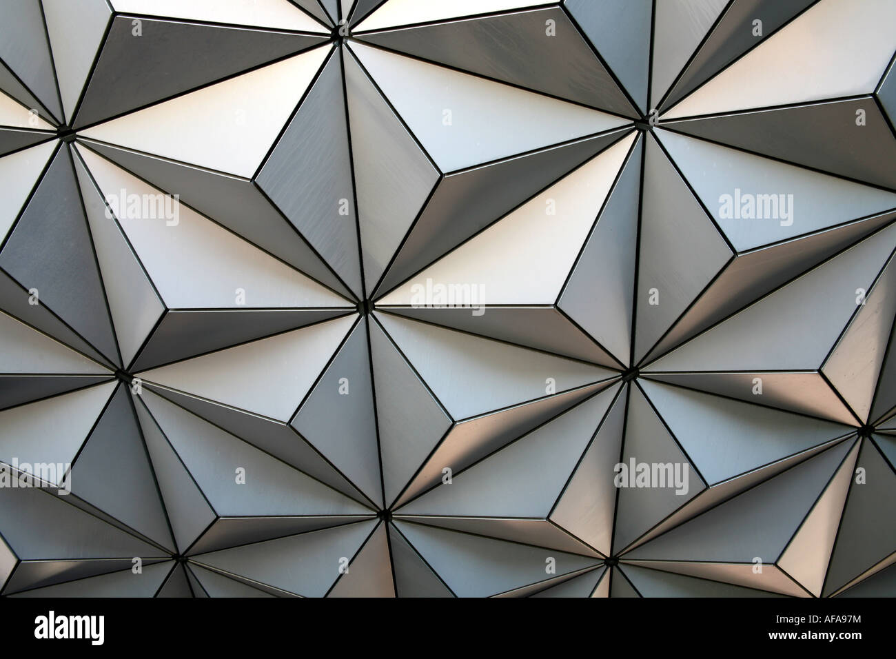 Geometric patterns on the surface of a geosphere showing lines, triangles, pyramids and other shapes. Stock Photo