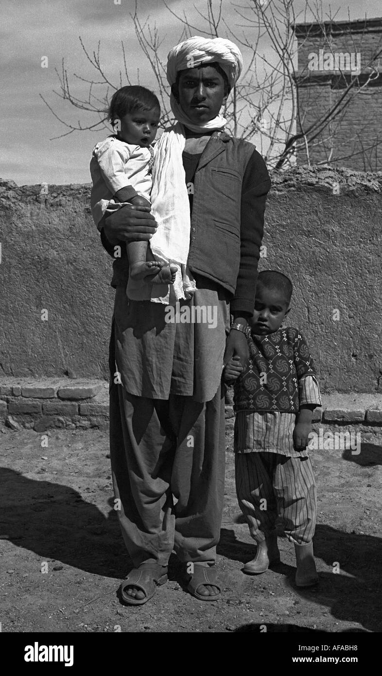 Afghan man with children, Ziyaratgah, Afghanistan Stock Photo