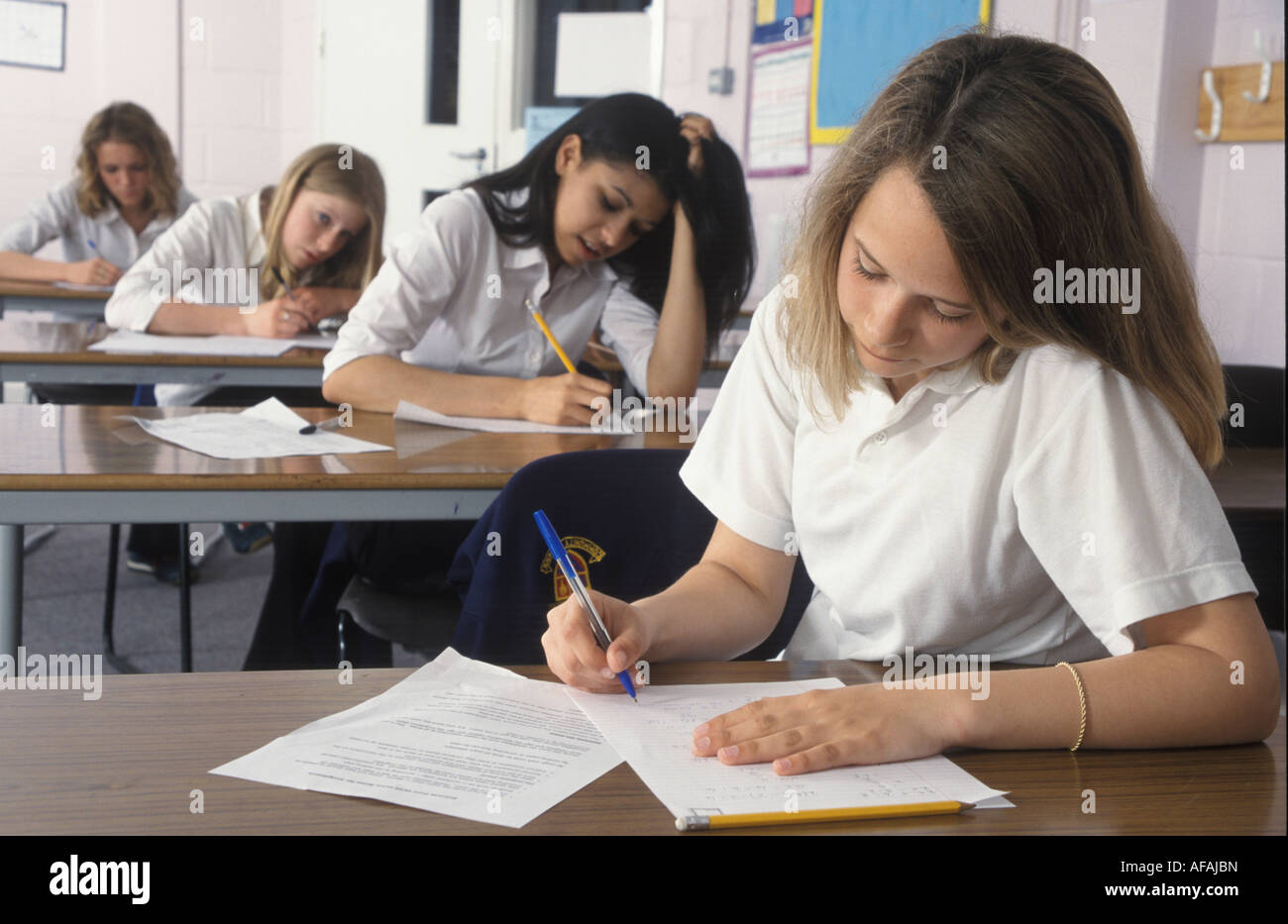 secondary school girls doing exams or test Stock Photo Alamy
