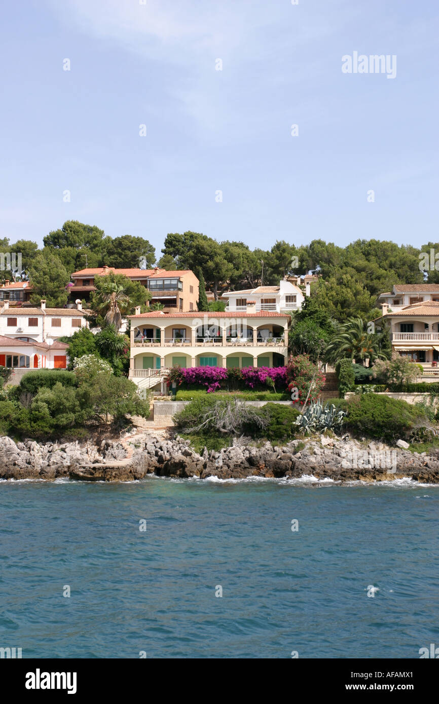 Villas by the sea outside Alcudia Mallorca Spain Stock Photo Alamy