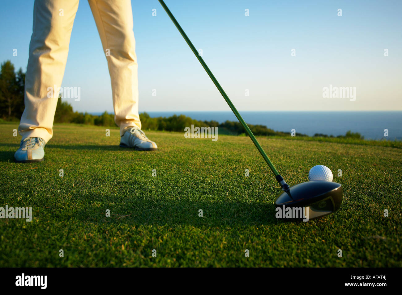 Golfer ready to shot using driver Stock Photo Alamy