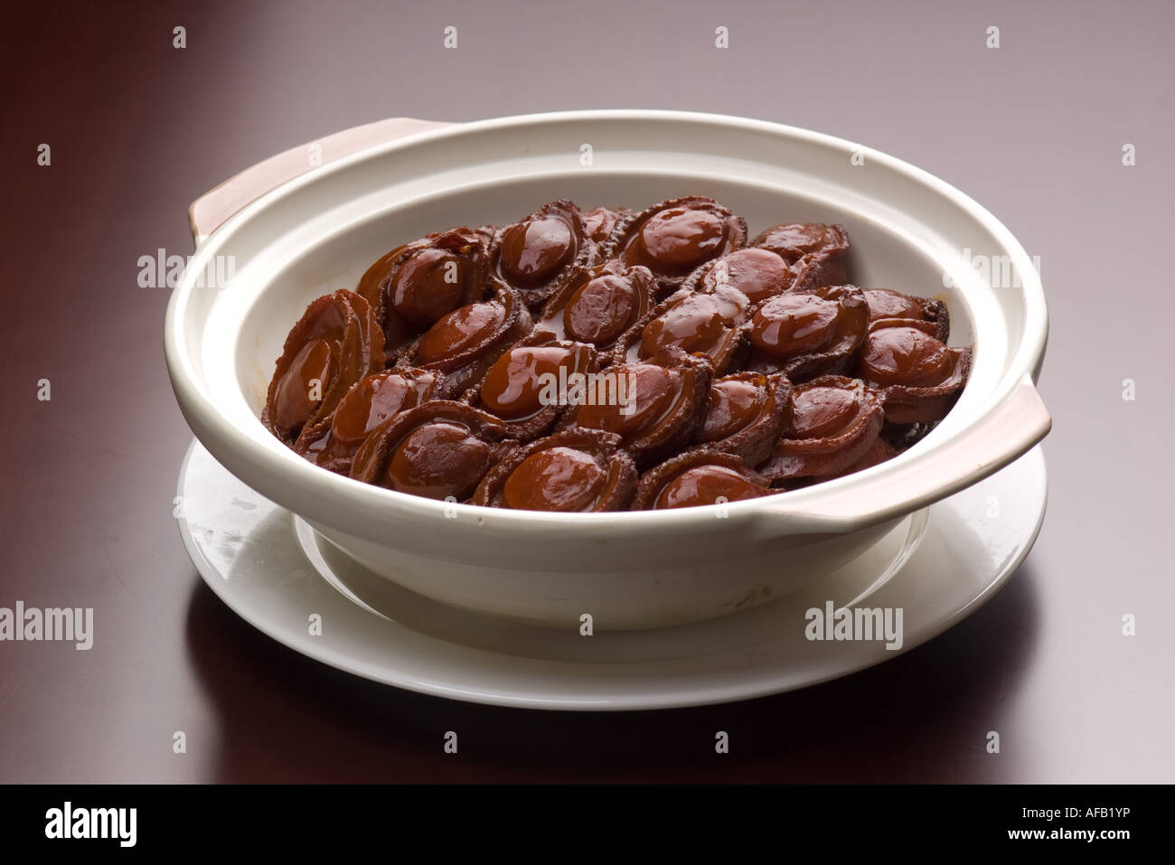 Chinese Food Braised Dried Abalone in Oyster Sauce Stock Photo Alamy