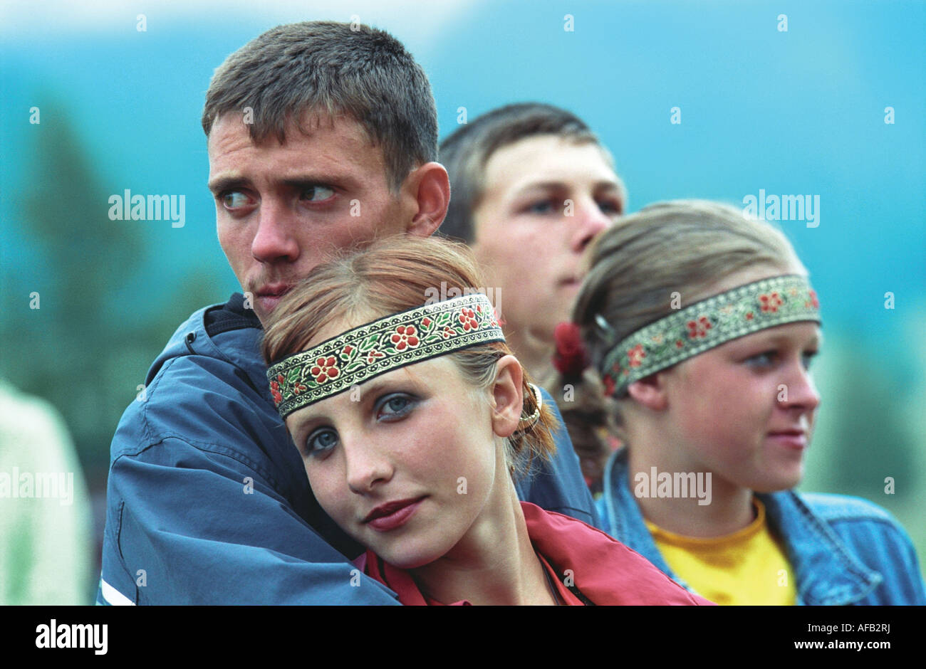 Portrait of love couples in Russian native raiment. El-Oiyn - national festival of Altaic people. Russia Stock Photo