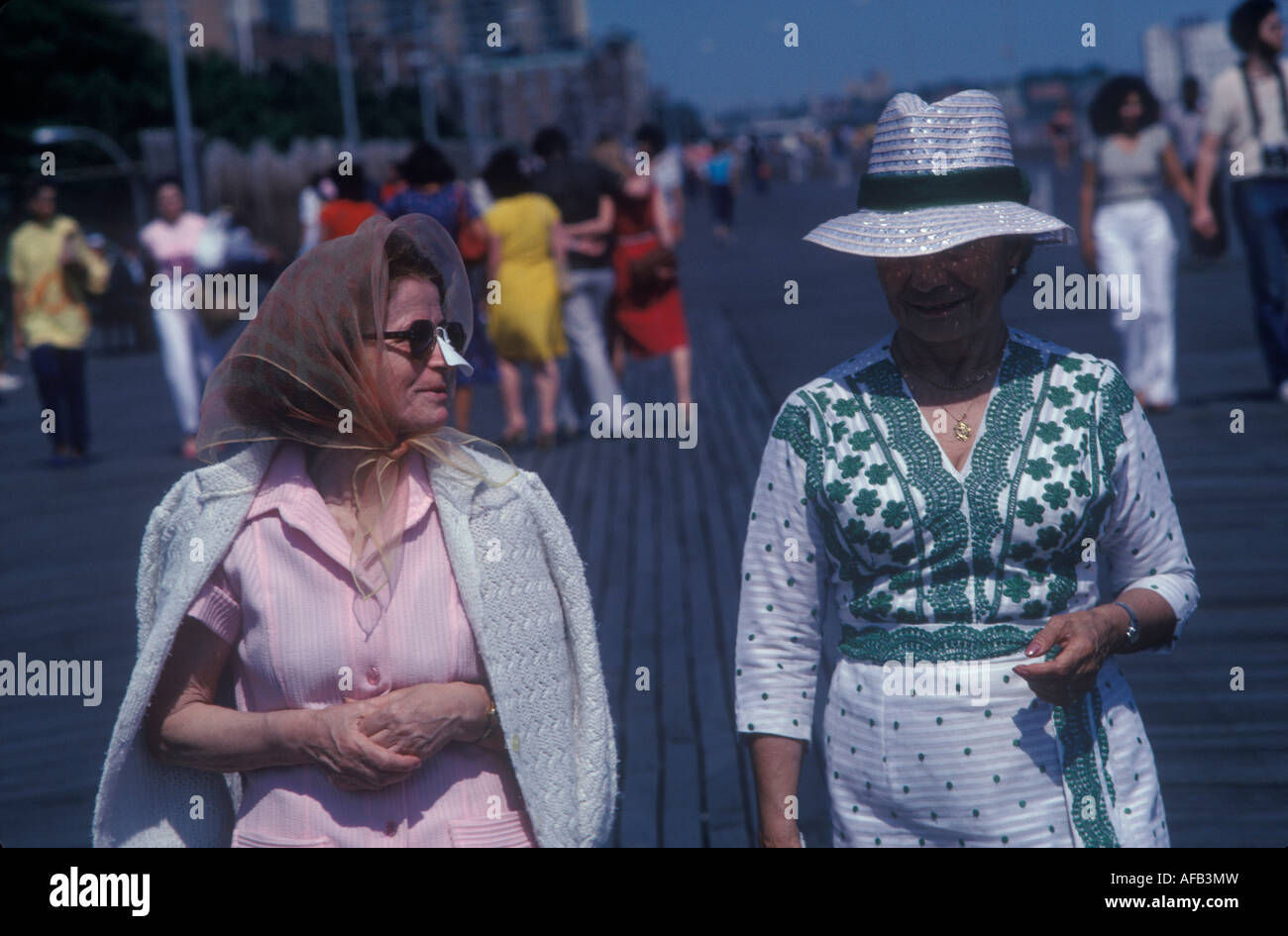 Retro Coney Island two women on vacation one wears a popular fashionable sun shield for her nose1980s 1981 Brooklyn, New York City US USA HOMER SYKES Stock Photo