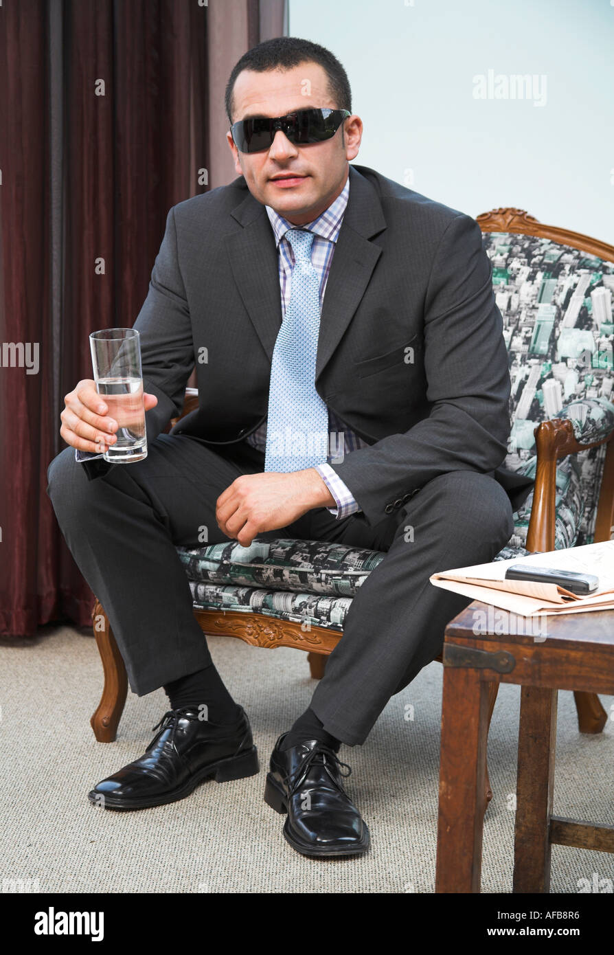 portrait of man wearing suit and sunglasses Stock Photo - Alamy