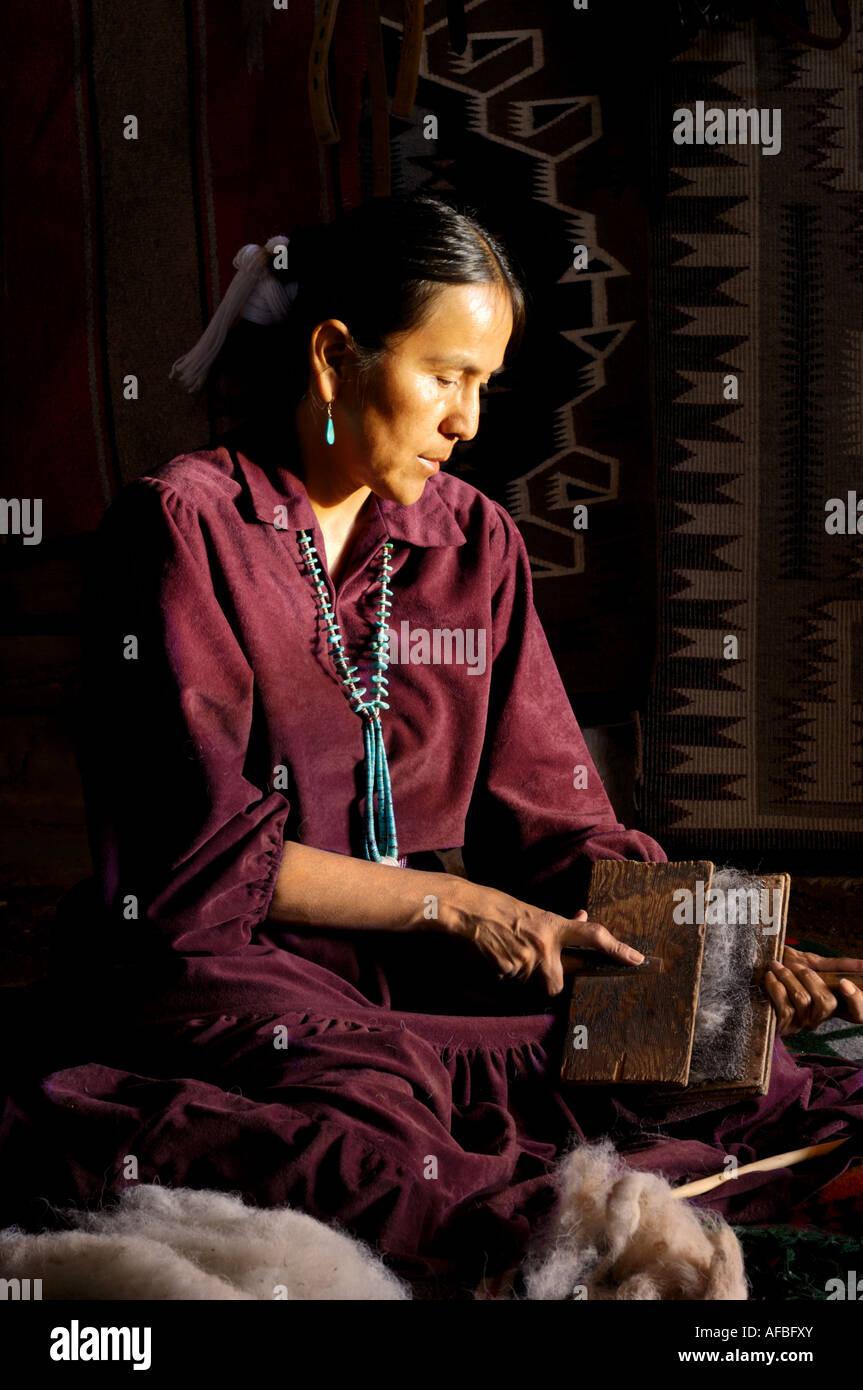 Navajo weaver carding wool Stock Photo