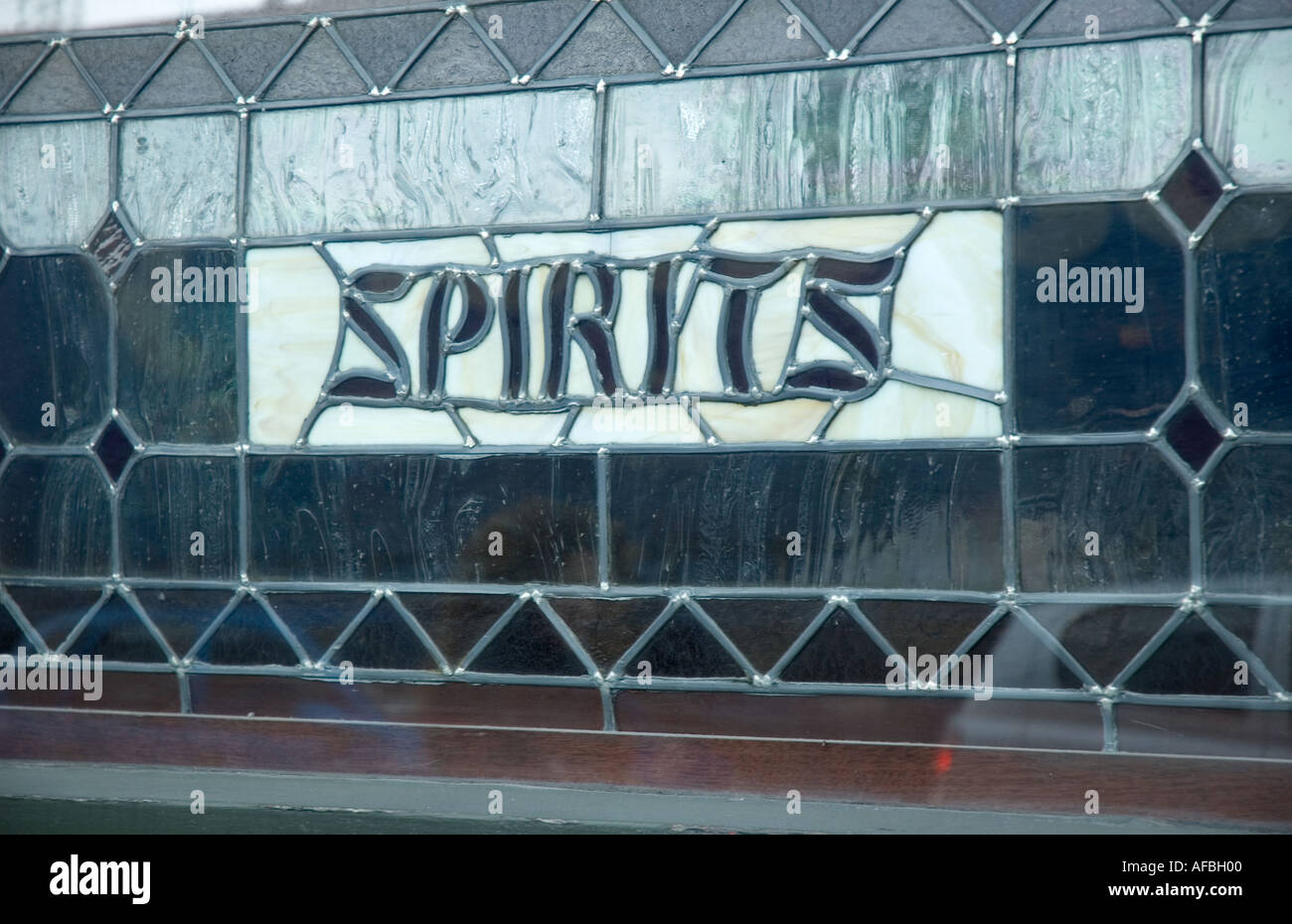 Stained glass window with Spirits sign in Dublin Ireland Stock Photo