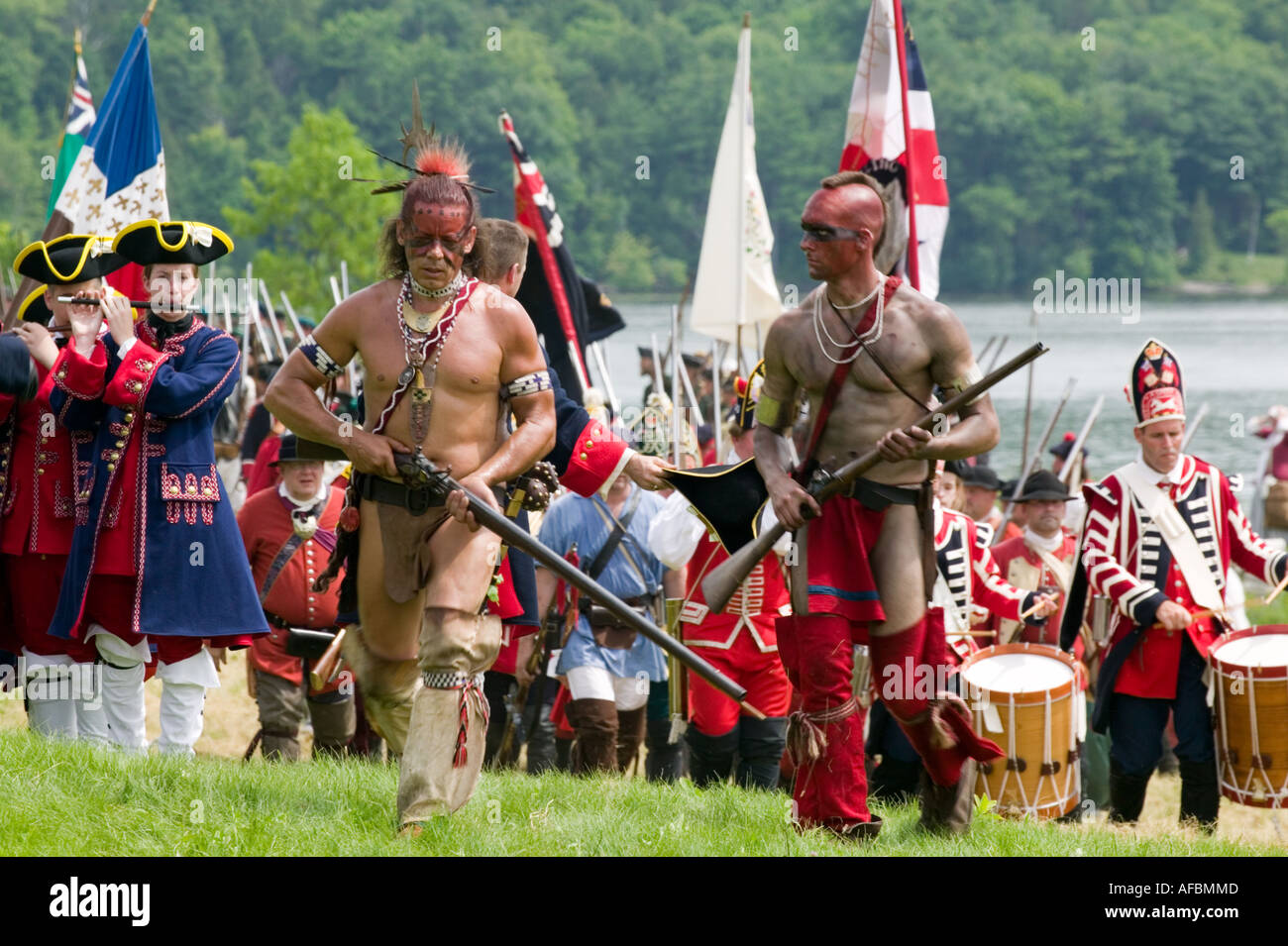 Portraying Indians and British soldiers Fort Ticonderoga New York annual Grand Encampment reenactment of French Indian War Stock Photo