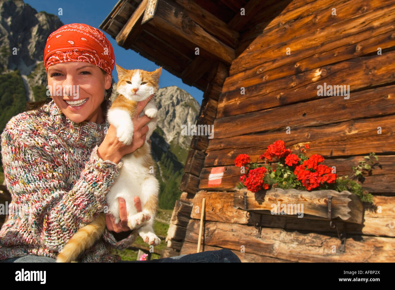 Woman holding cat Stock Photo