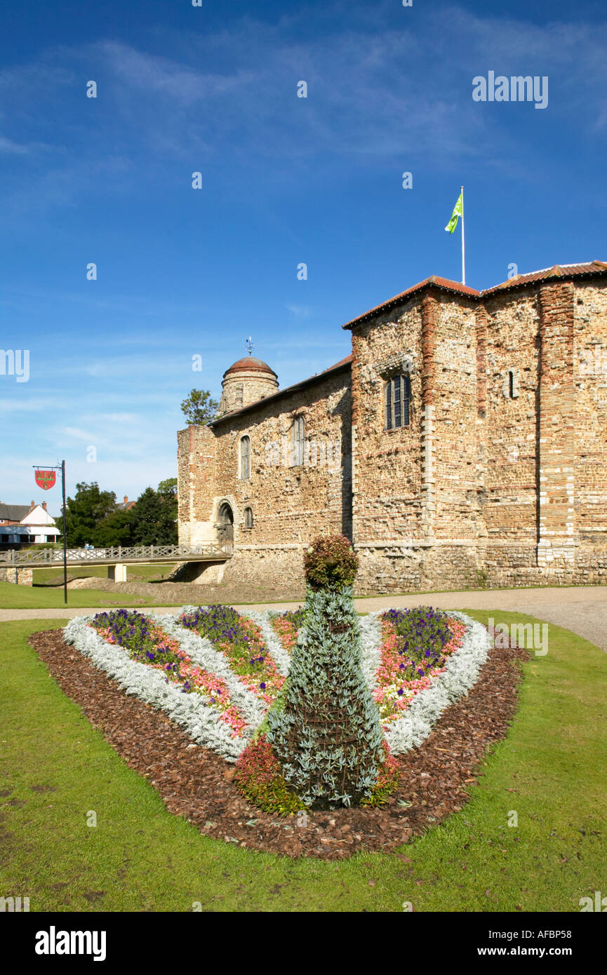 England Essex Colchester Castle and Decorative Peacock Flower Bed Stock Photo