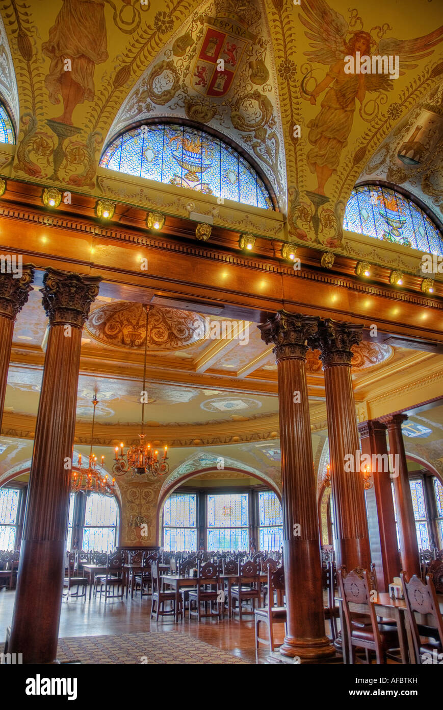 dining hall of Flagler College with Tiffany windows and murals by