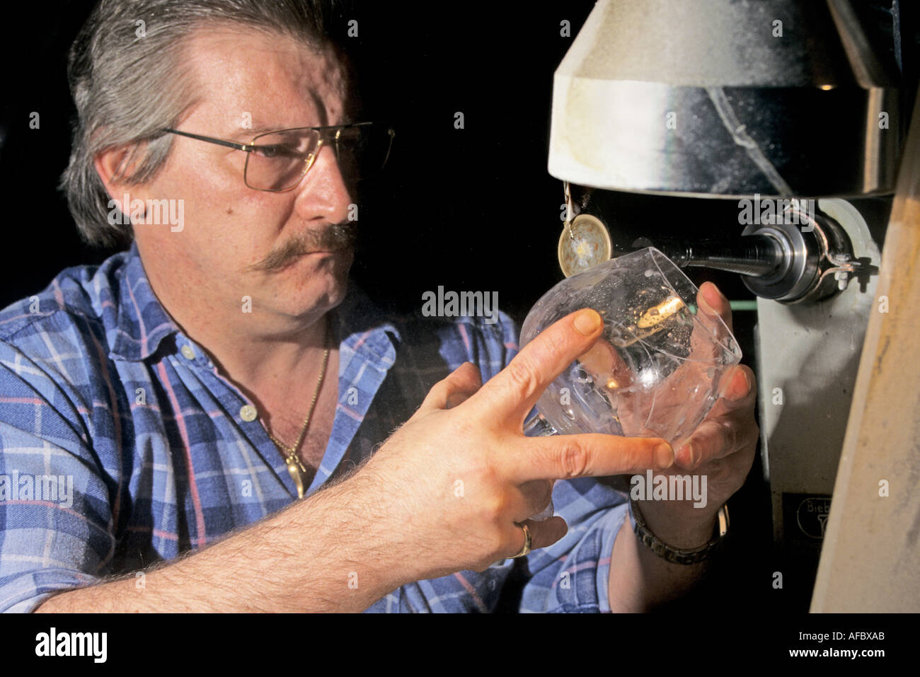 Glass engraving by hand Val Saint Lambert crystal factory Belgium Stock Photo