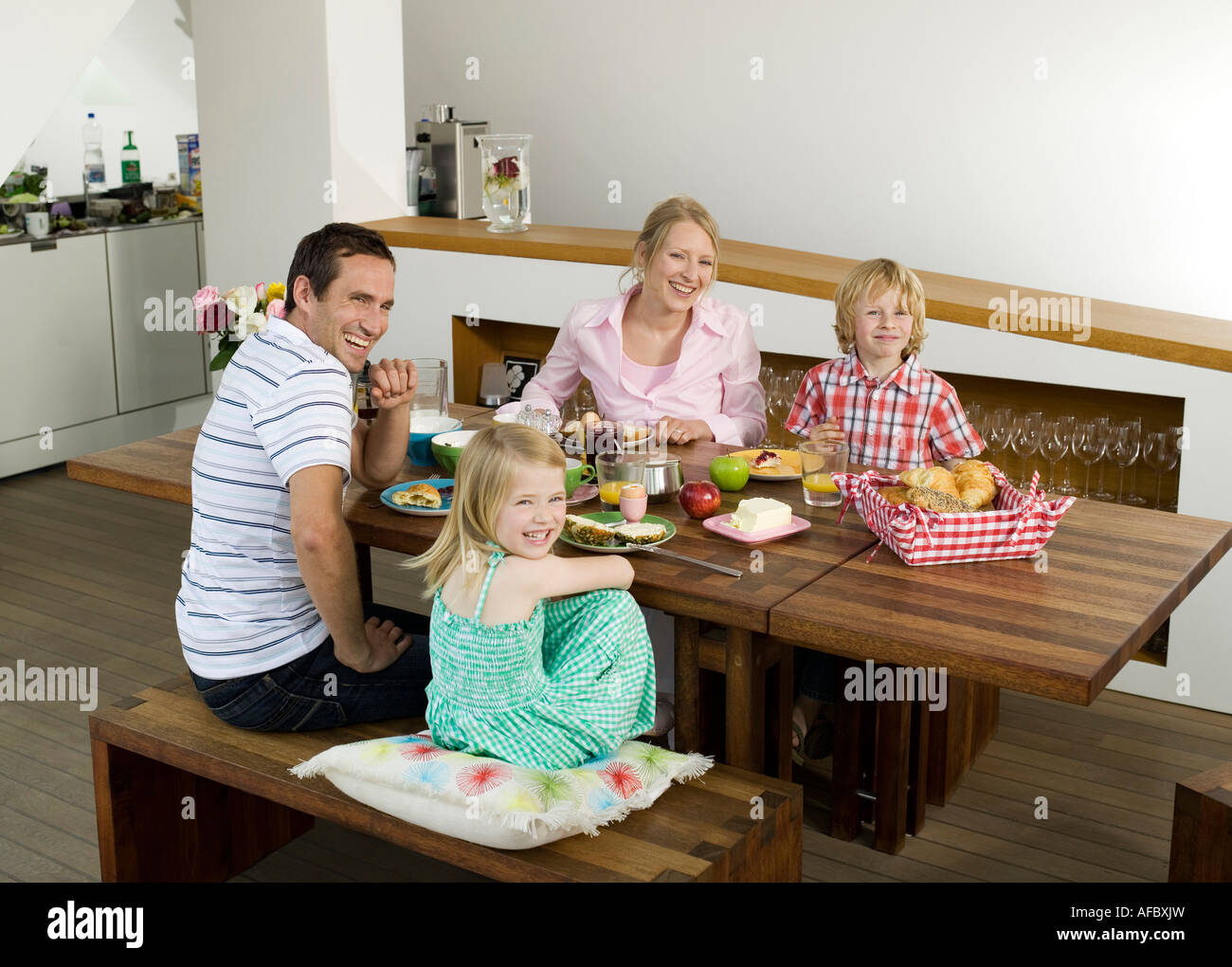 Family at breakfast table Stock Photo - Alamy