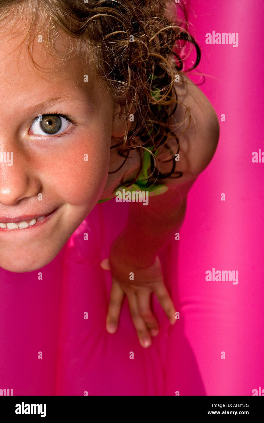 Young girl on air mattress Stock Photo