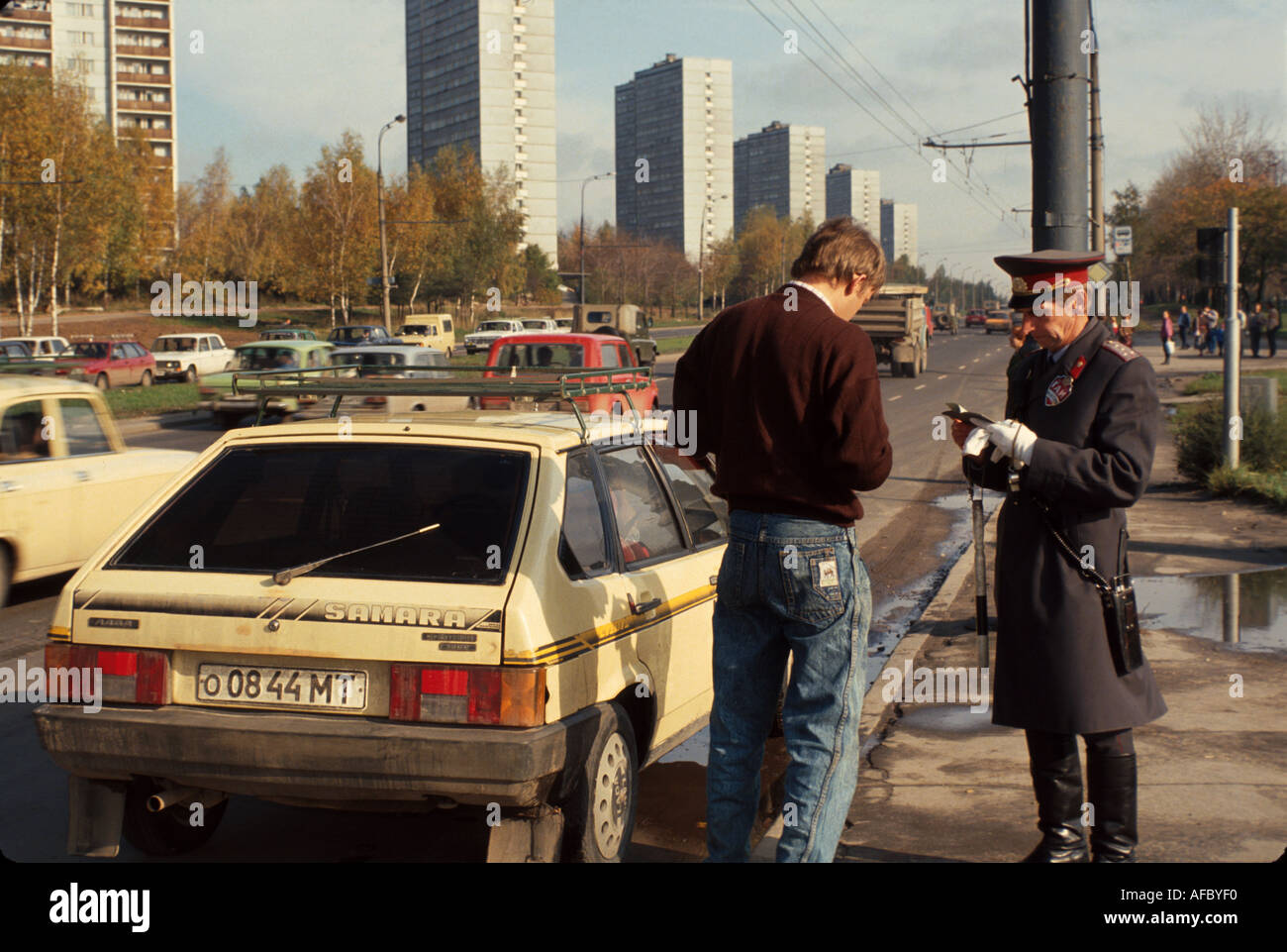 Moscow Russia,Eastern Europe European,Russian Federation,traffic patrol,warden,writes ticket,stopped motorist,Rus031 Stock Photo