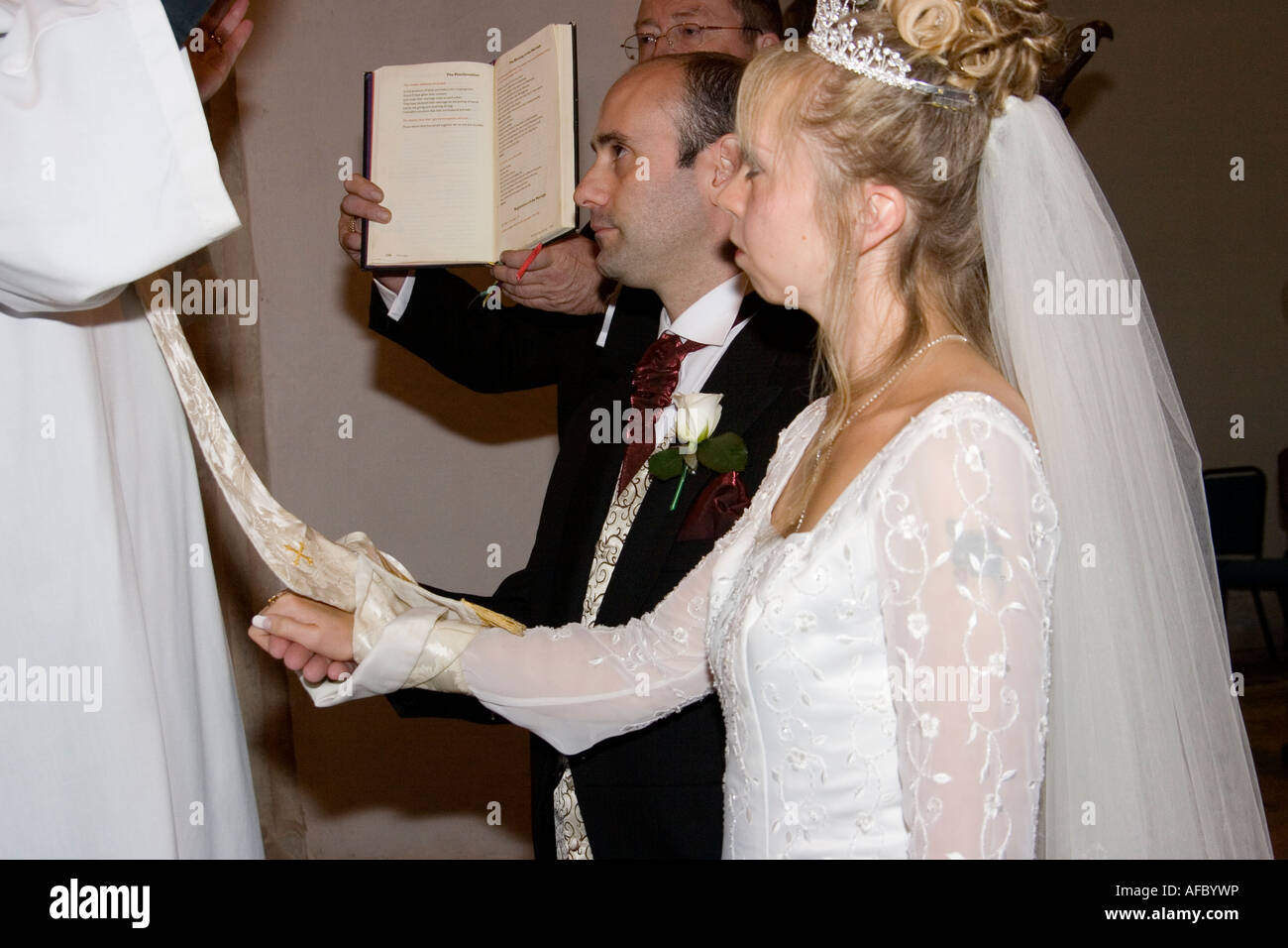 "Tying the Knot" or hand fasting during a christian wedding ceremony