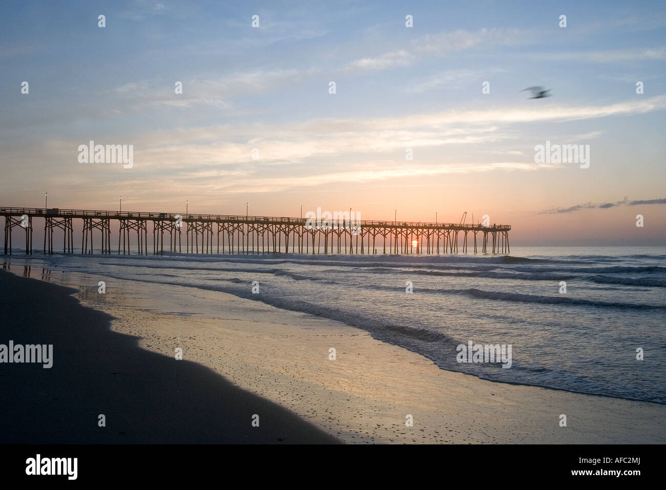 Sunrise hour at Carolina Beach fishing pier, town of Carolina Beach