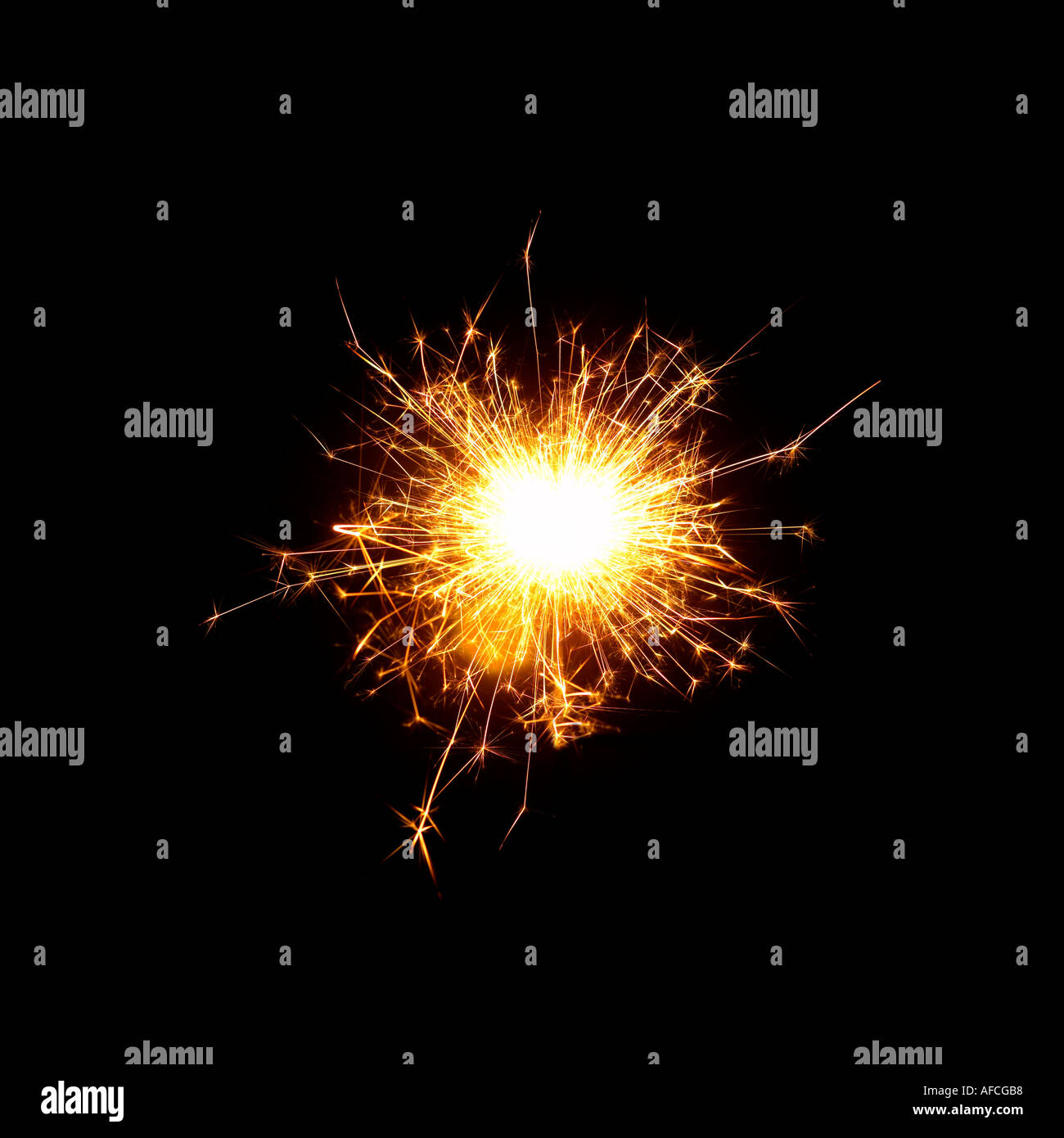 Sparkler flames against black background Stock Photo