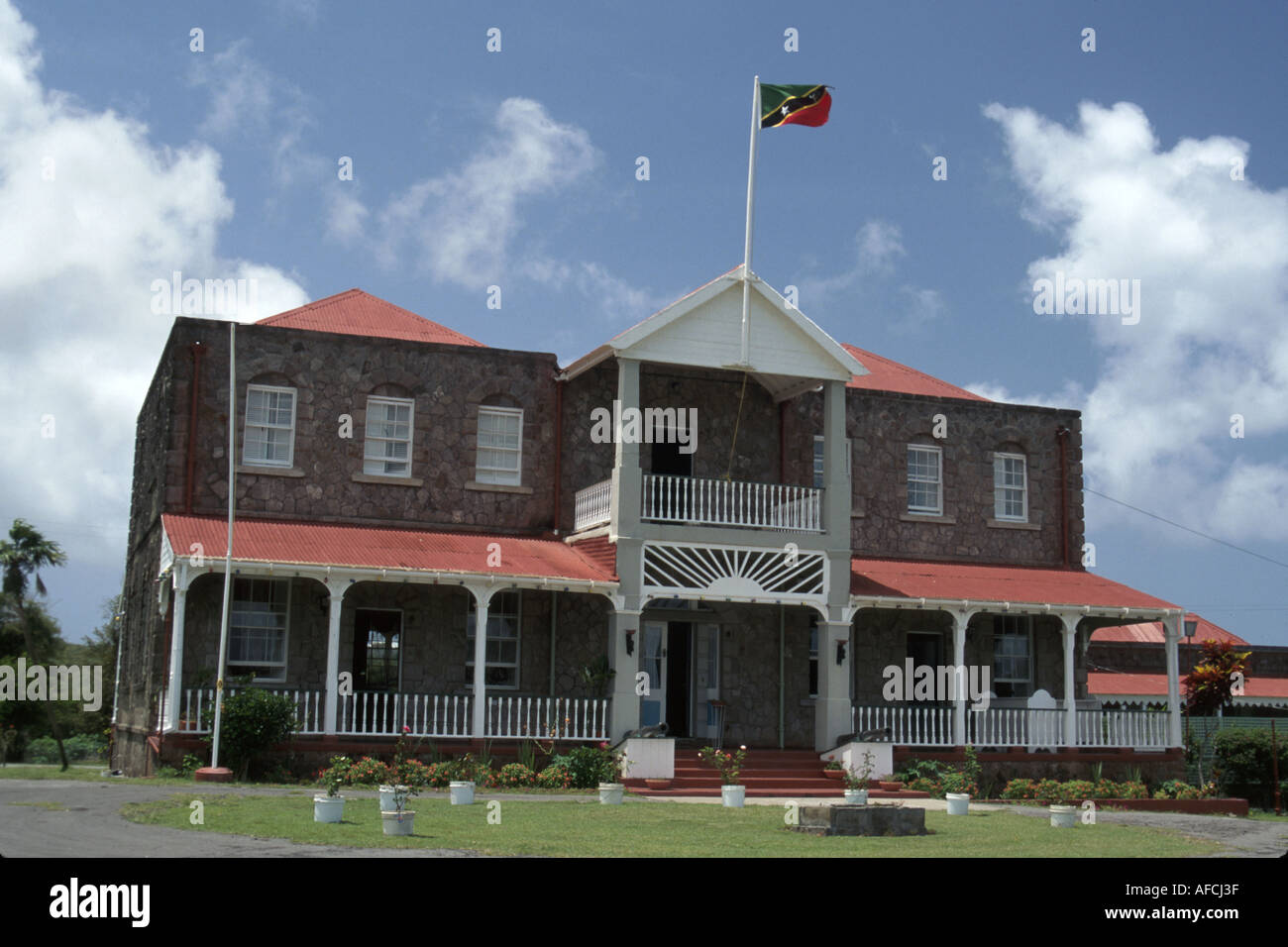 Nevis,West Indies,Windward Islands,Caribbean Sea,water,Tropics,warm weather,climate,St. Kitts,Charlestown,Governor’s house,houses,constructed,built 19 Stock Photo