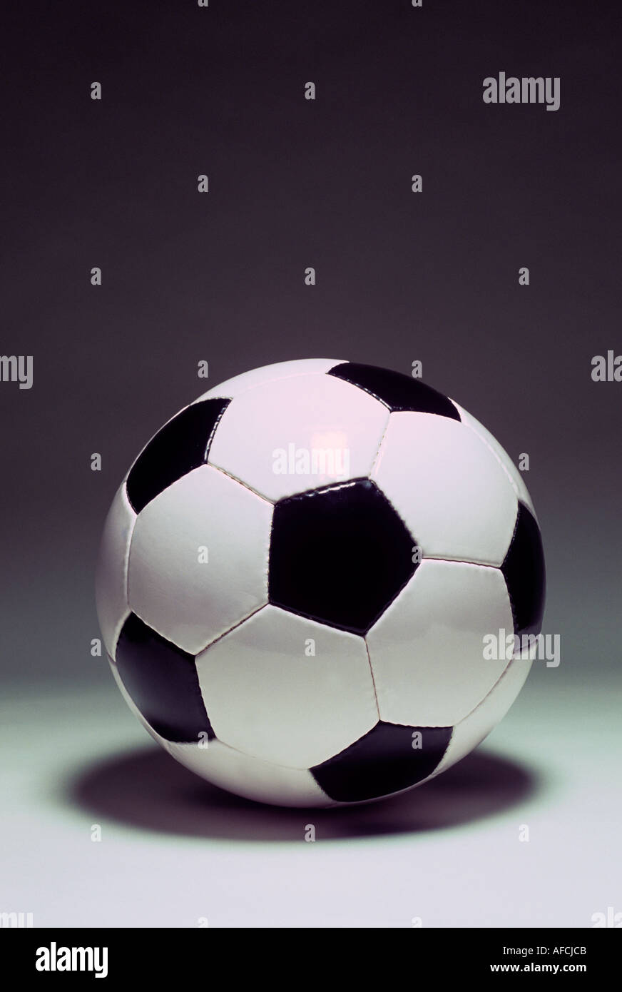 FOOTBALL ON BACKGROUND PAPER Stock Photo Alamy