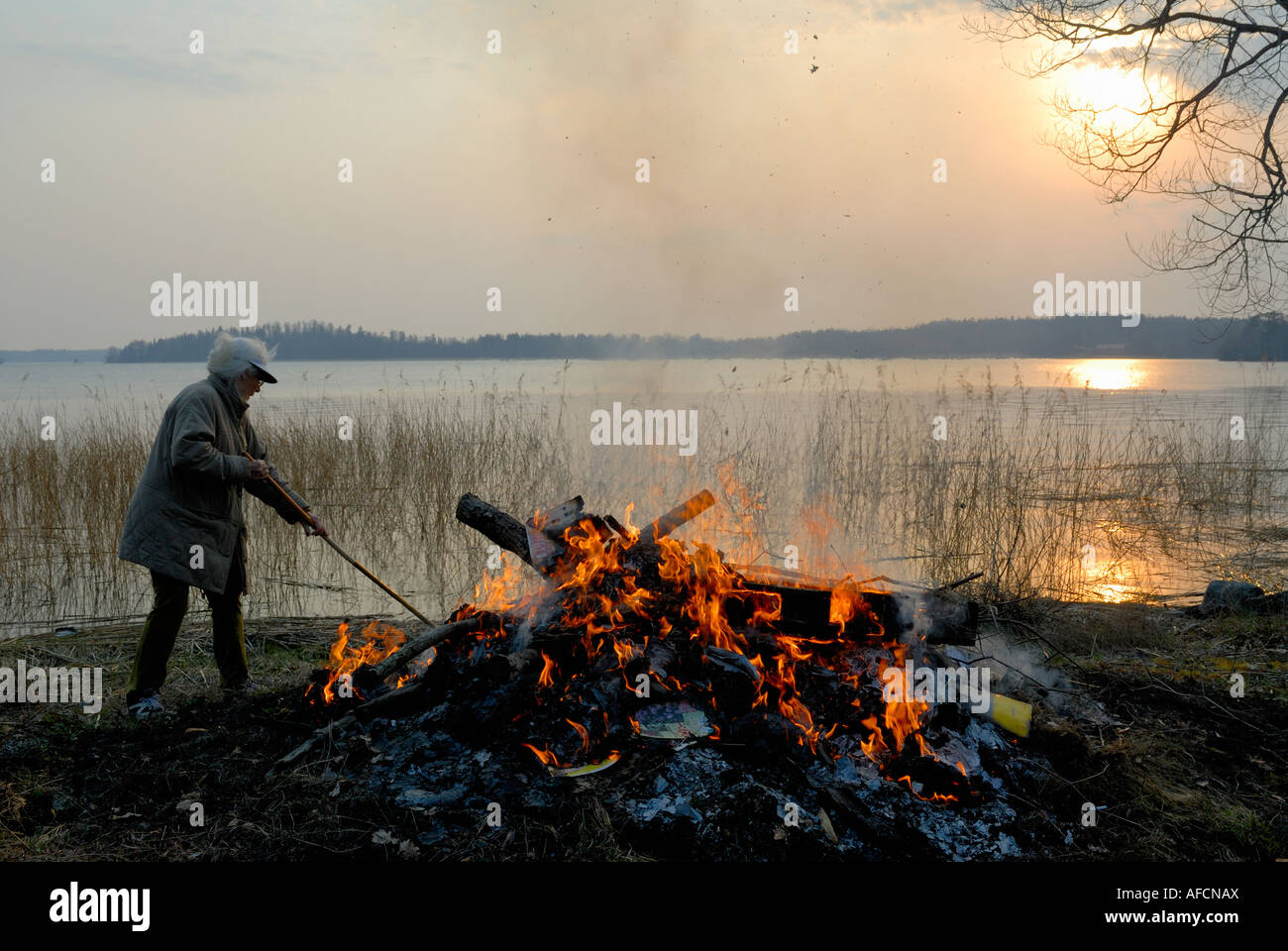 bonfire near lake, Sweden Stock Photo